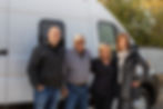 Paul Domish with clients in front of their newly completed custom camper van at Drifter Vans HQ.